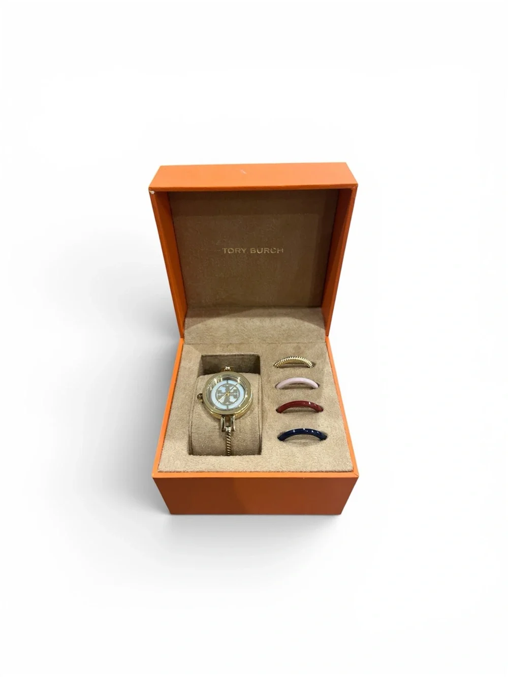 Tory Burch Gold-Tone Watch with Interchangeable Bezels in Cream, Pink, Red, Navy